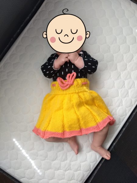 baby wearing knit skirt soaker